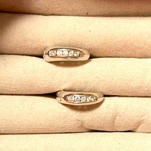 Custom designed 14K white gold earrings with 10 channel set diamonds.